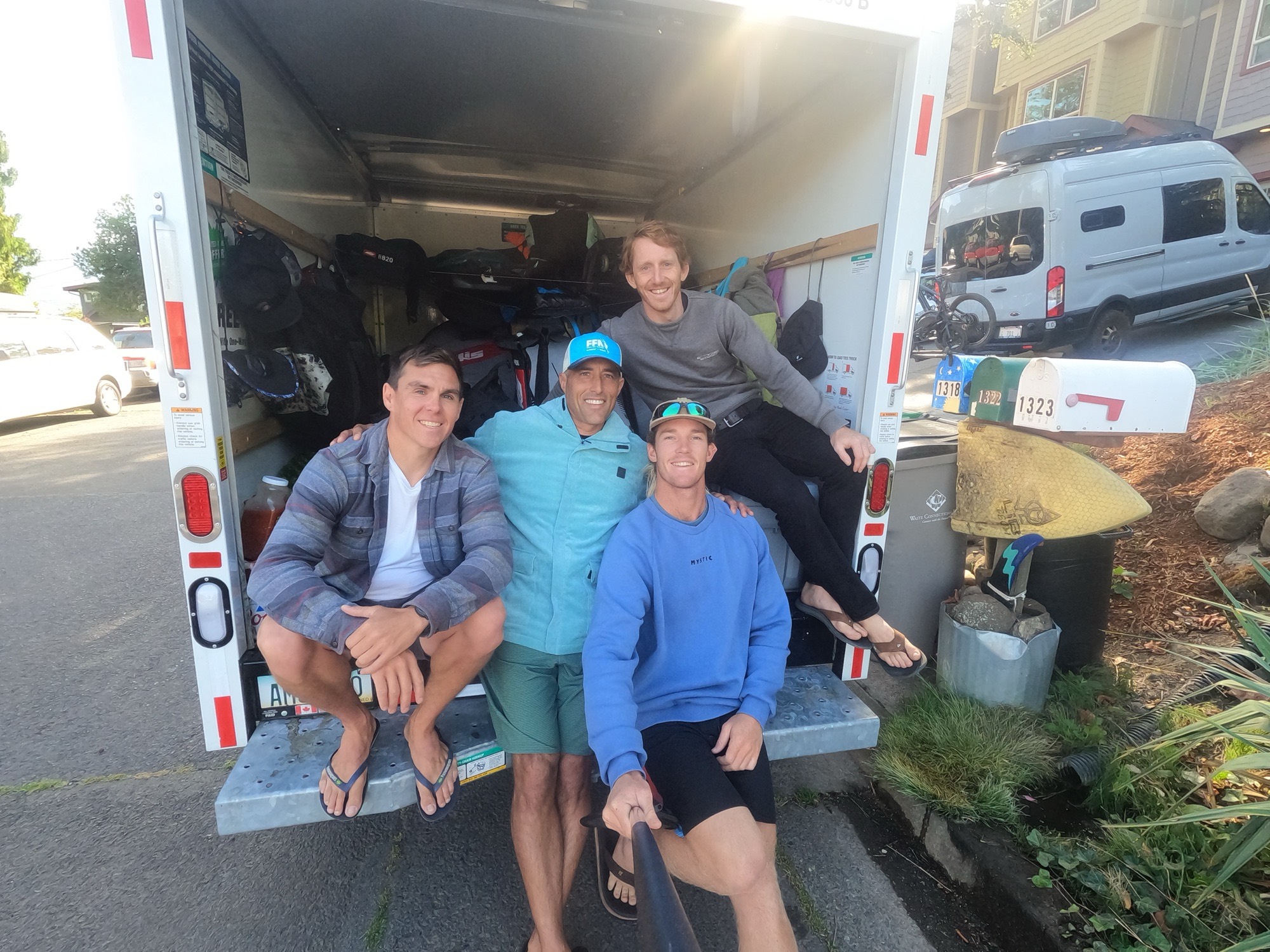 The crew on the back of the U-Haul